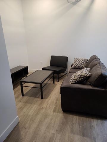 Park City apartment for rent - a living room with a couch and tables