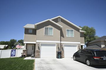 Cedar City apartment for rent - a house with a car parked in front of it
