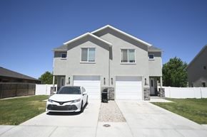Cedar City apartment for rent - a car parked in front of a house