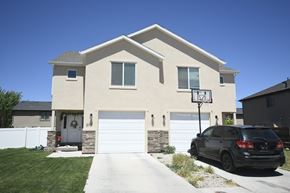 Cedar City apartment for rent - a house with a car parked in front of it