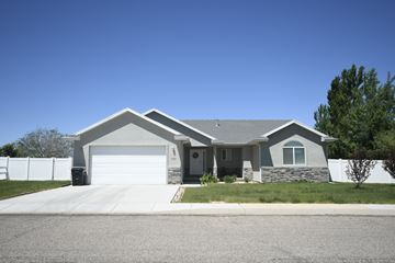 Cedar City apartment for rent - a house with a driveway and a garage door