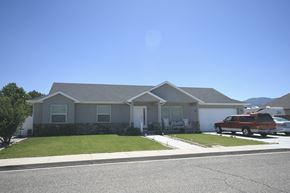 Cedar City apartment for rent - a house with a truck parked in front of it