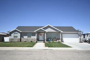 Cedar City apartment for rent - a house with an flag on the front of it