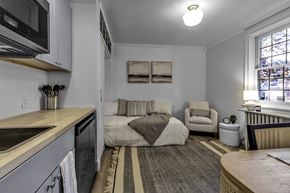 Buffalo apartment for rent - A kitchen with a sink and a window.