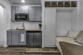 Buffalo apartment for rent - A kitchen with a sink, dishwasher, and microwave.