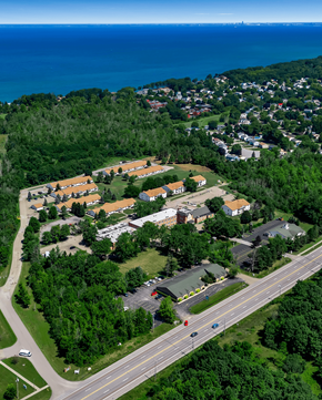 Buffalo apartment for rent - A bird's eye view of a residential area with a road running through it.