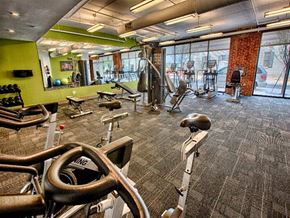 Huntsville apartment for rent - a gym with a large amount of exercise equipment