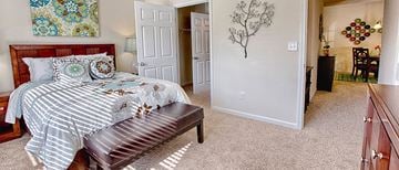 Tuscaloosa apartment for rent - a bedroom with a bed and a closet