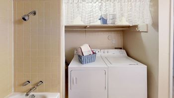 In home laundry area with washer dryer connections
