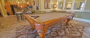 Tuscaloosa apartment for rent - a pool table in a living room