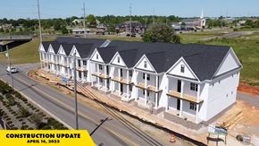Tuscaloosa townhouse for rent - A construction update image of a building under construction with the text "CONSTRUCTION UPDATE APRIL 16, 2025" on it.