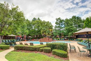 Sparkling tropical style pool with sundeck