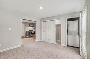 Independence apartment for rent - A white kitchen with a fridge, oven, and microwave.