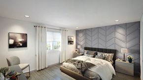 Talahassee apartment for rent - A modern bedroom with a large bed and a grey patterned wallpaper.