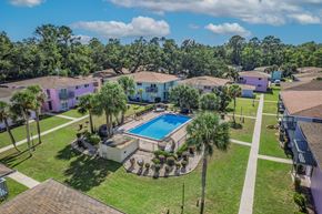 Tallahassee apartment for rent - Aerial Pool And Green Space at Serenity Place Central, Tallahassee, FL, 32304