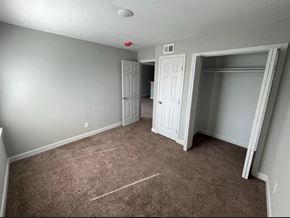 Topeka apartment for rent - a bedroom with carpet floor and a closet