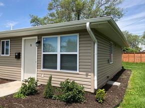 Belton triplex for rent - a duplex building with a window