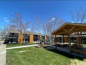 Grandview apartment for rent - a playground with a pavilion in front of a building