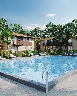 Talahassee apartment for rent - A swimming pool in front of apartment buildings.