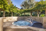 Santa Ana apartment for rent - A hot tub sits in the middle of a garden at The Aspens Fairhaven, Santa Ana, 92705