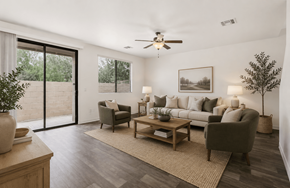 Tucson apartment for rent - A living room with a grey couch, a wooden coffee table, and a ceiling fan.