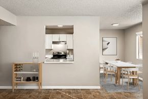 St. George apartment for rent - a kitchen and dining room with a white table and chairs at Bella Vista, St. George, UT