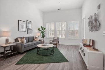 Atlanta apartment for rent - a living room with a couch and a table