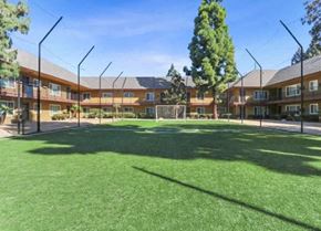 Santa Ana apartment for rent - a soccer field in front of an apartment building