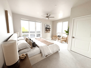 San Diego apartment for rent - A bedroom with a large bed and a ceiling fan.