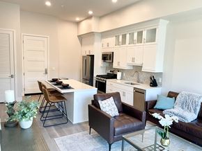 San Diego apartment for rent - a kitchen and living room with a table and chairs