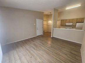 Bay Point apartment for rent - A room with wooden flooring and a white door.