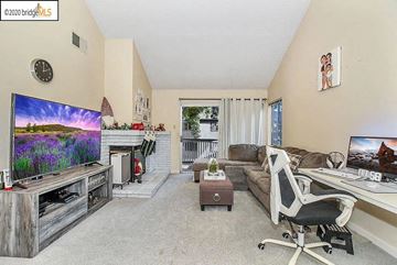 Bay Point condo for rent - a living room with a couch and a tv