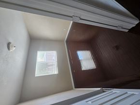 Pittsburg apartment for rent - a view of a window from inside a room with a large mirror