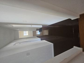 Pittsburg apartment for rent - a view of a kitchen from the top of the stairs