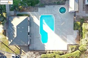 Bay Point condo for rent - an aerial view of a pool in the middle of a house