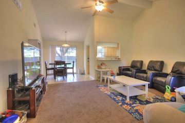 Pearland apartment for rent - a living room with a couch and a table