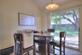 Pearland apartment for rent - an image of a dining room with a table and chairs