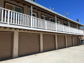 Antioch apartment for rent - a row of garage doors on the side of a building