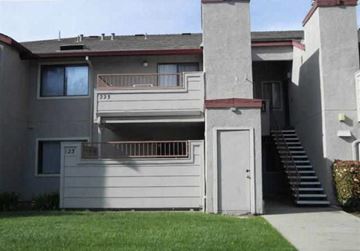 Bay Point apartment for rent - the front of a gray house with a white door