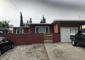 Pittsburg apartment for rent - the front of a house with a driveway and a garage door
