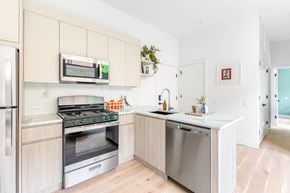 Chicago apartment for rent - A kitchen with a stove, oven, and refrigerator.