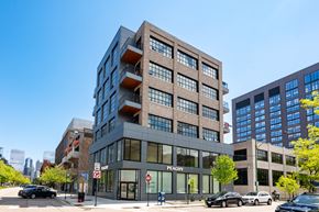 Chicago apartment for rent - A modern building with the word "Peachy" on the front.
