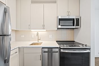 Modern kitchen with white cabinetry