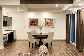 Phoenix apartment for rent - a dining room with a table and chairs and a kitchen