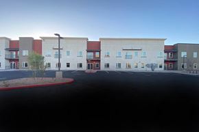 Phoenix apartment for rent - an empty parking lot in front of an apartment building