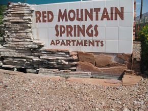 Phoenix apartment for rent - a sign for red mountain springs apartments