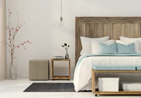 Glendale apartment for rent - a bedroom with a bed and a wooden headboard