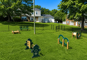 Raleigh townhouse for rent - A playground with a green slide and a sign that says Green.