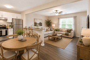 Gastonia apartment for rent - A well-lit, modern kitchen and dining area with a wooden table and chairs.