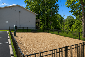 Gastonia apartment for rent - A small building with a parking lot in front of it.